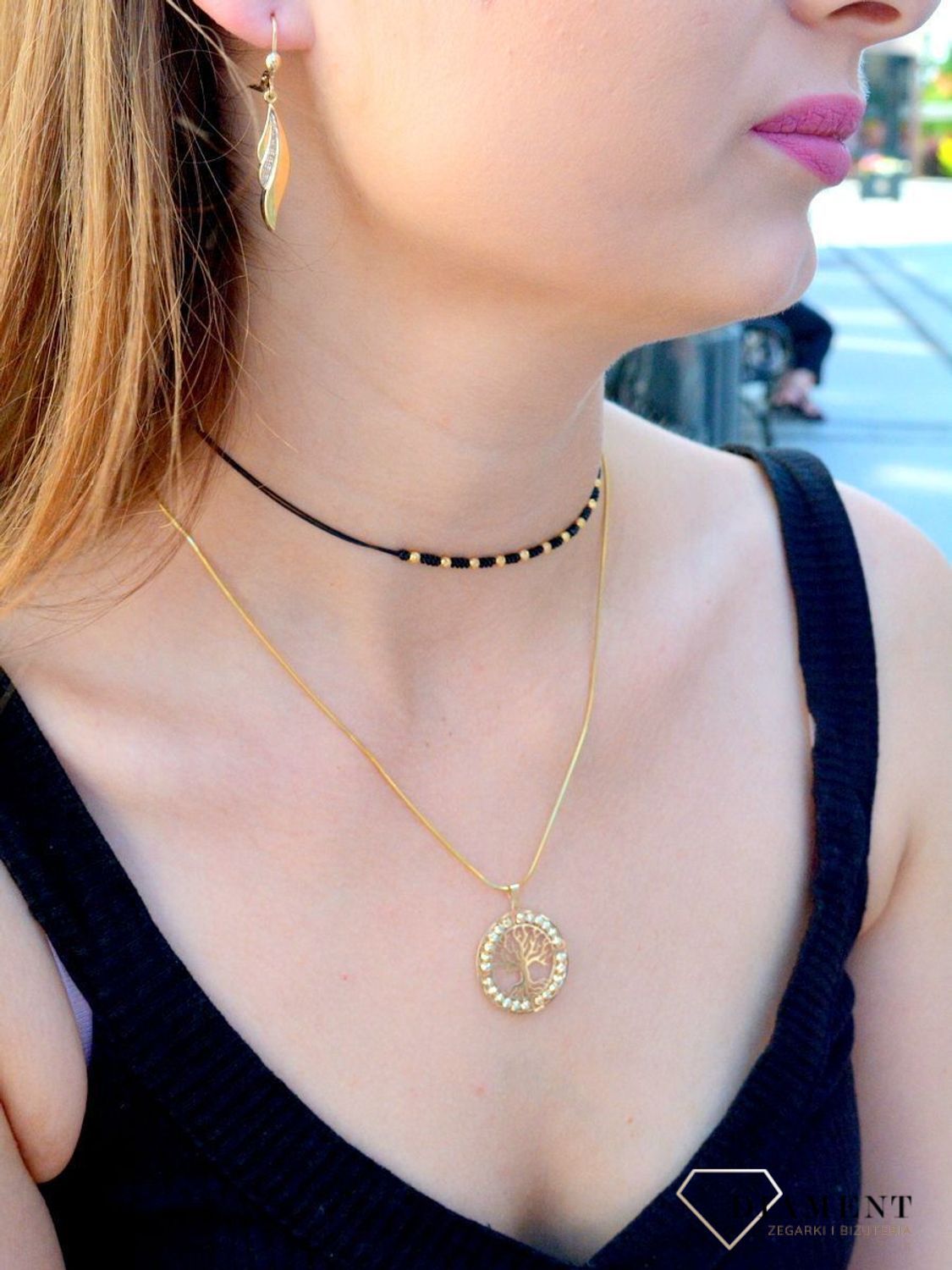 Złota zawieszka pr 333 drzewko szczęścia ZA 6331 333. Złota zawieszka w kształcie drzewka na szczęście ozdobiona grawerowanymi kuleczkami. Elegancki wisiorek wykonany z próby 333 żółtego złota. Ta unikalna biżuteria, która zachwyci każd.jpg